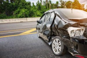 A dented car from an auto accident